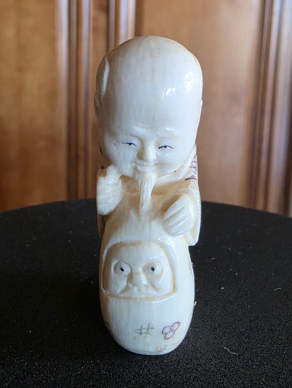 Netsuke Hand-Carved Figurine - Standing Smiling Man with Papoose - EUC RARE